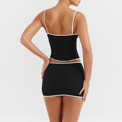Özel yeni renk kontrast boş halter eteği iki parça moda takım elbise